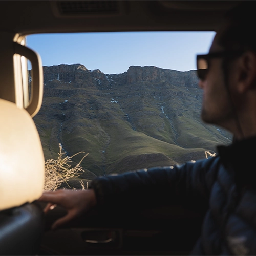 happy sani pass guest enjoying the view
